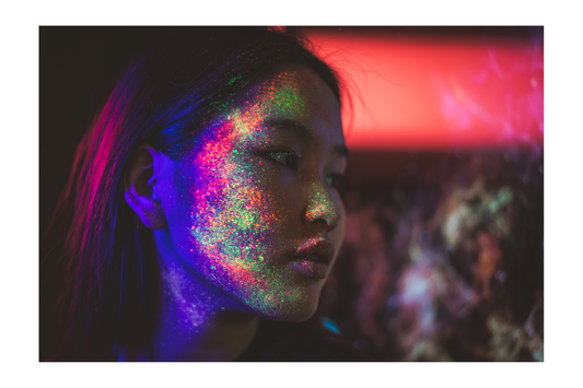 woman wearing lots of neon pigment on her face