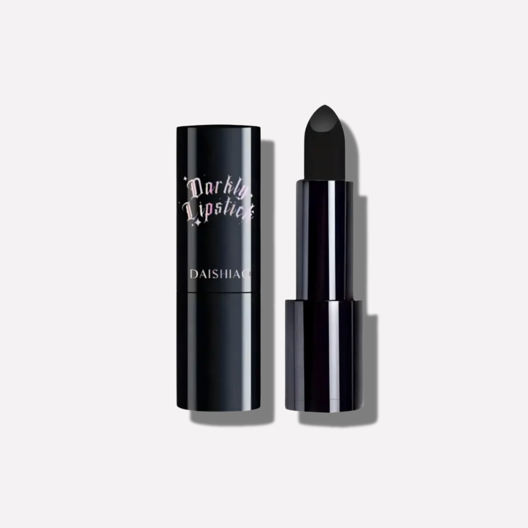 Black lipstick with packaging on a light gray background