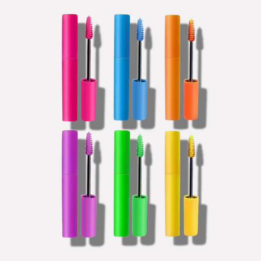 Set of colorful mascara tubes with applicators on a white background