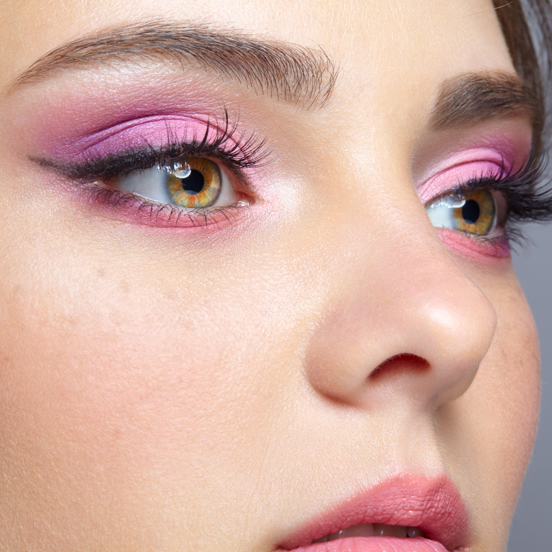 Model wearing light pink shimmer eye dust eyeshadow
