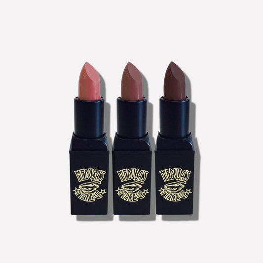 Three lipsticks with black cases and visible brand logo on a white background