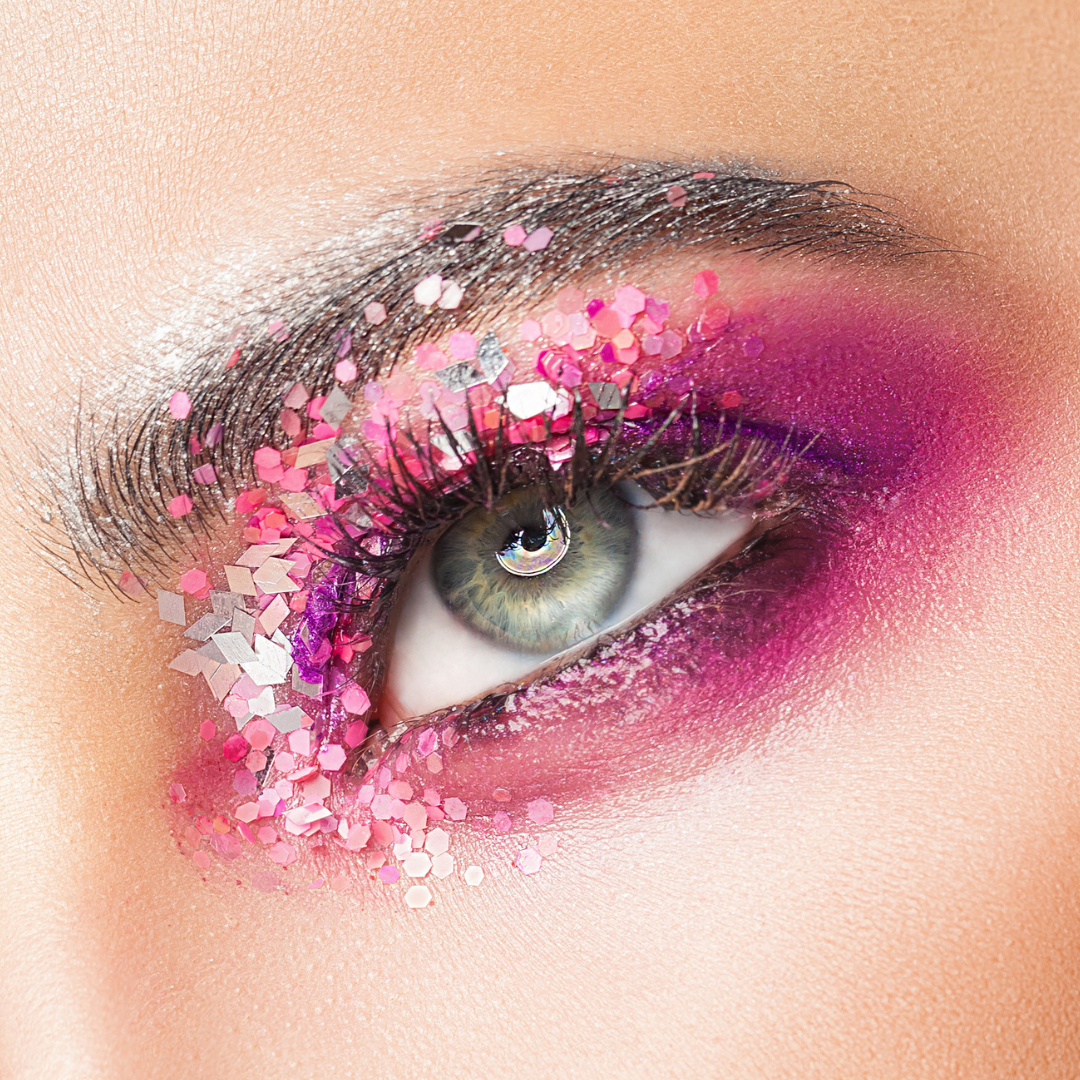 Closeup of a models eye wearing chunky glitter eyeshadow