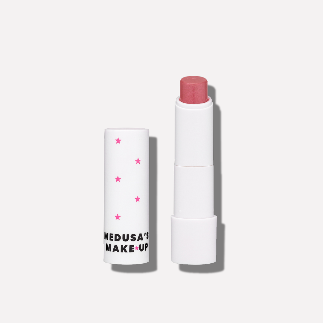 Lip balm with 'Medusa's Make-Up' branding on a white background