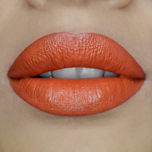 Model wearing vegan Lipstick - Rio