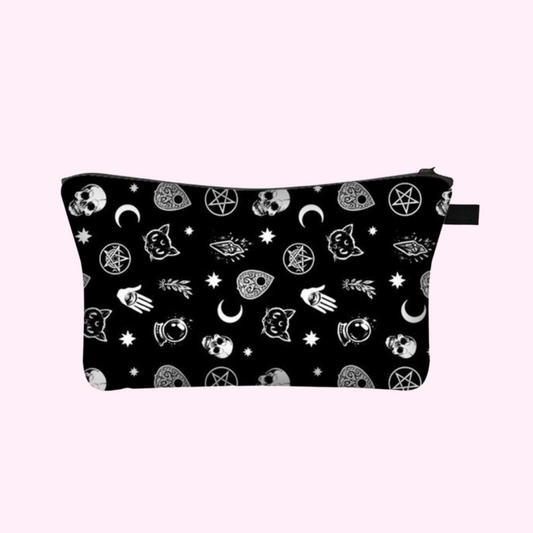 Black cosmetic bag with a pattern of skulls, moons, and various other gothic-inspired elements.