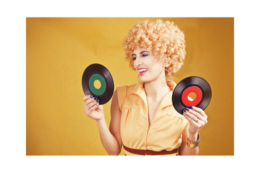 woman holding music records