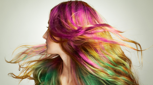 girl swishing her rainbow hair