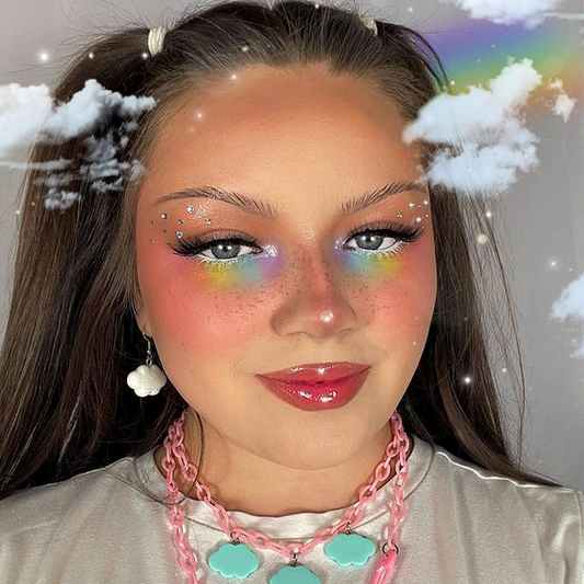 @caked_with_kelsie wearing a rainbow pride look.