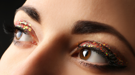 woman with reddish gold glitter eyeshadow