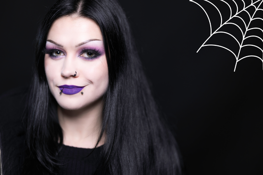 gothic woman with purple eye makeup and lipstick