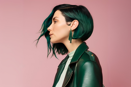 woman with dark green hair and a leather jacket