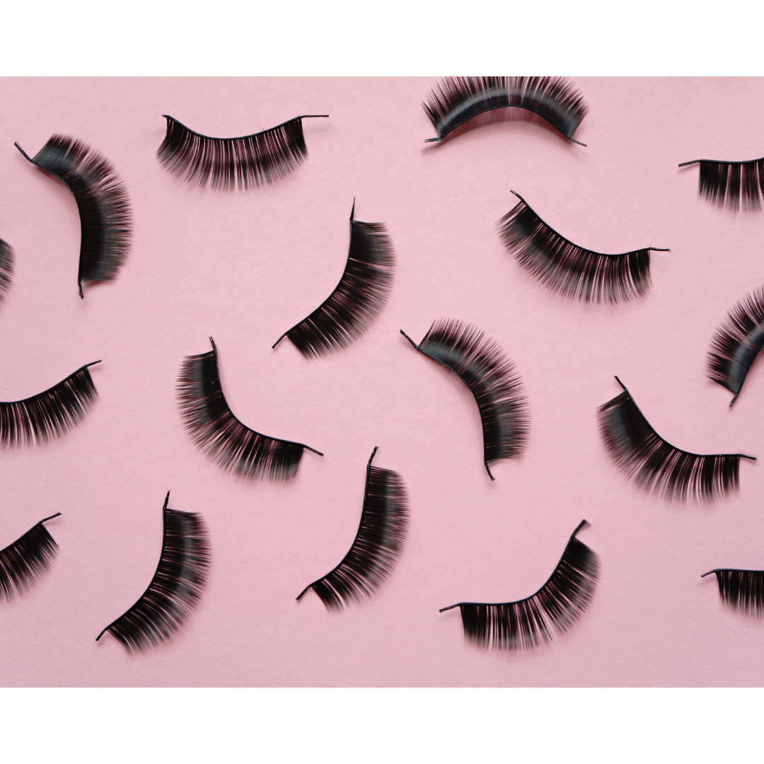 pink background with lots of false lashes all around