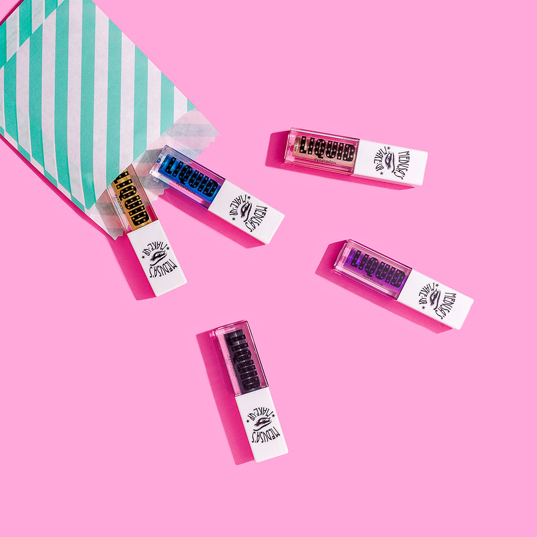 liquid eyeshadow set on pink background