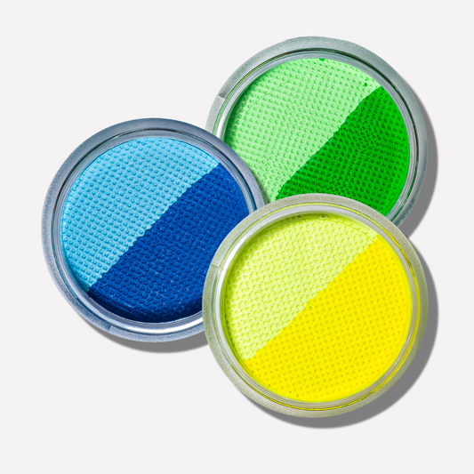 Three round containers with blue, green, and yellow color swatches on a white background