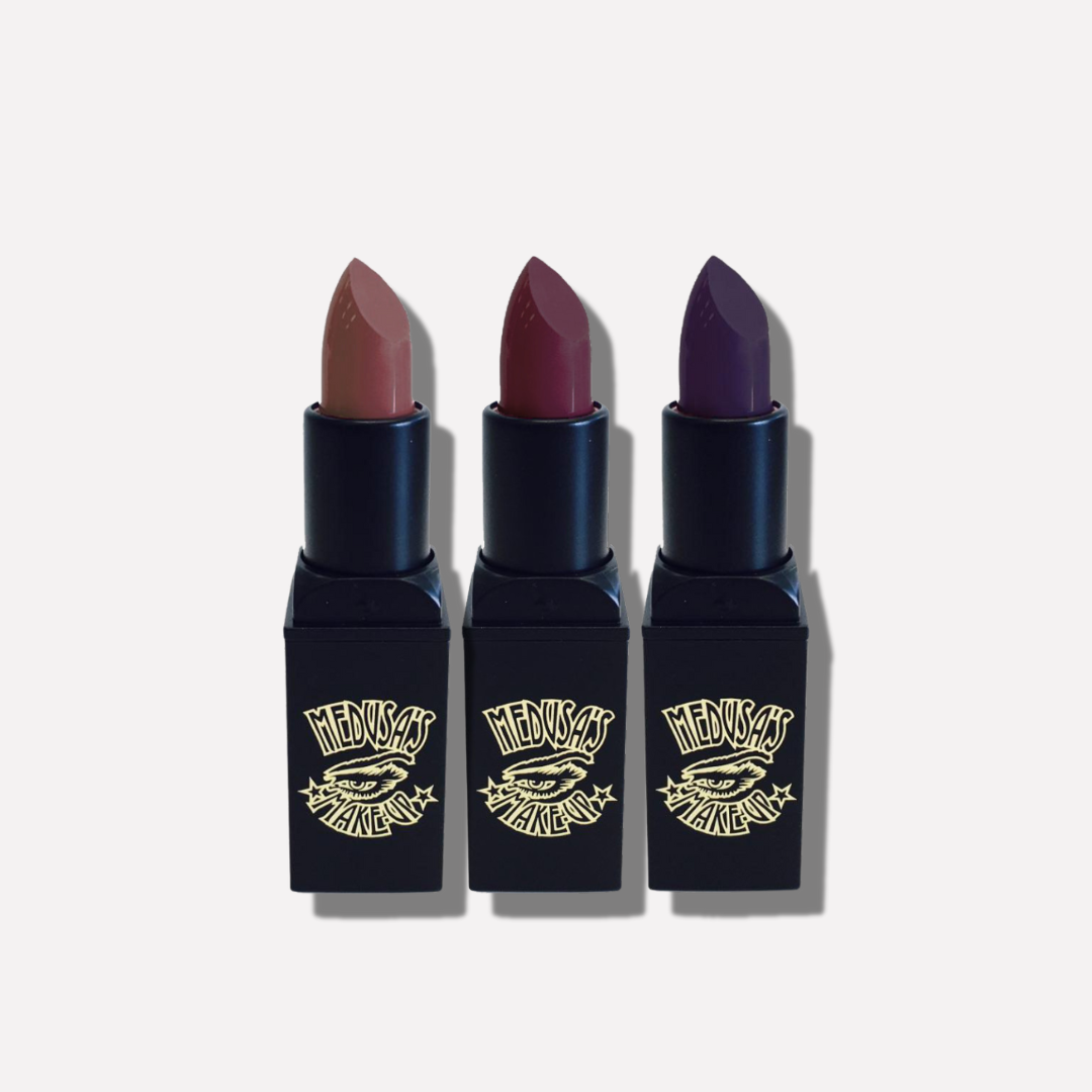 Three lipsticks with different colors on a white background, featuring a brand logo.