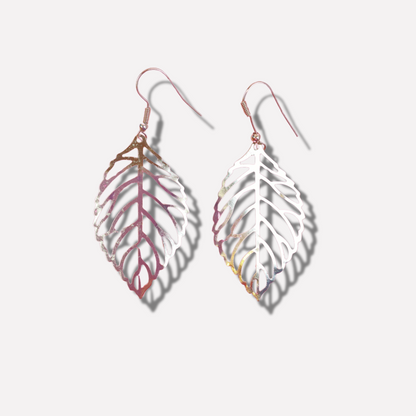 Pair of leaf-shaped earrings on a light gray background
