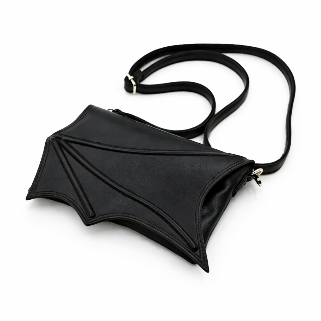 Black bat-wing shaped bag on a white background