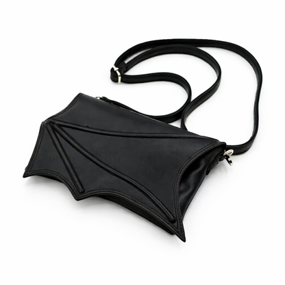 Black bat-wing shaped bag on a white background