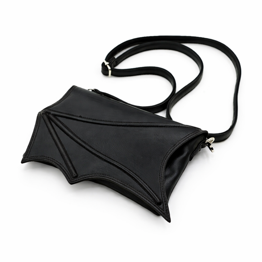 Black bat-wing shaped bag on a white background