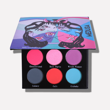 Makeup palette with colorful shades and 'Medusa' branding on a white background