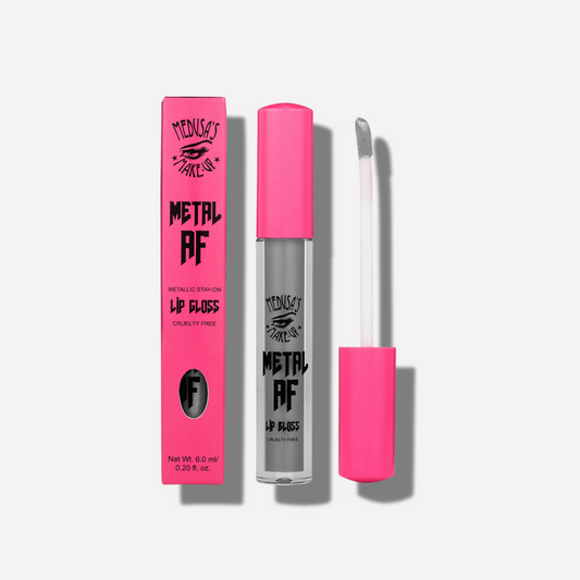 Metallic lip gloss with pink packaging and applicator on a white background