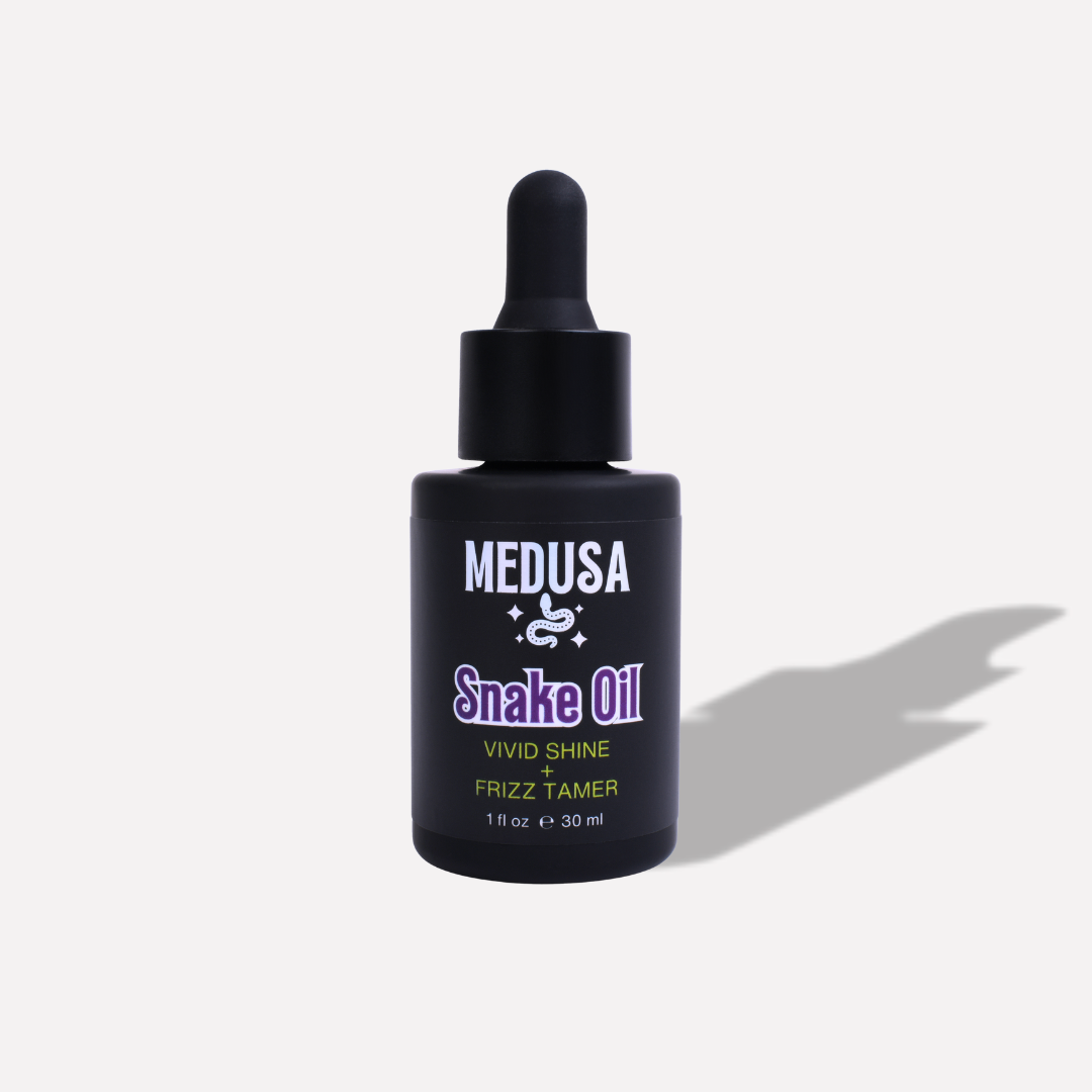 Bottle of Medusa Snake Oil on a white background