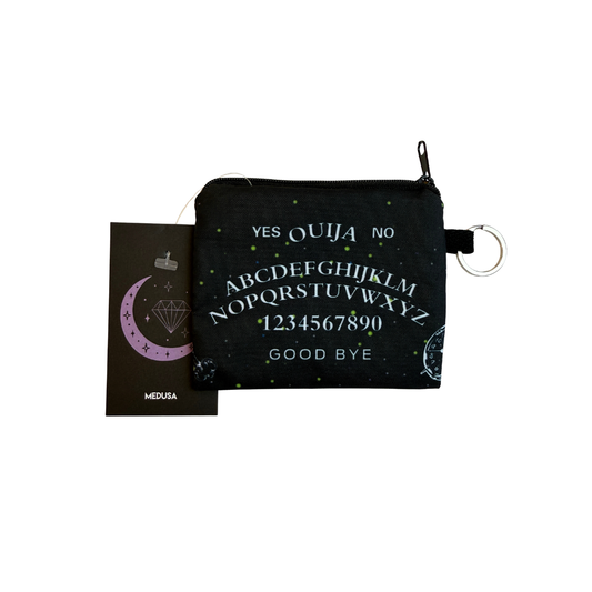 Black pouch with Ouija board design on a white background