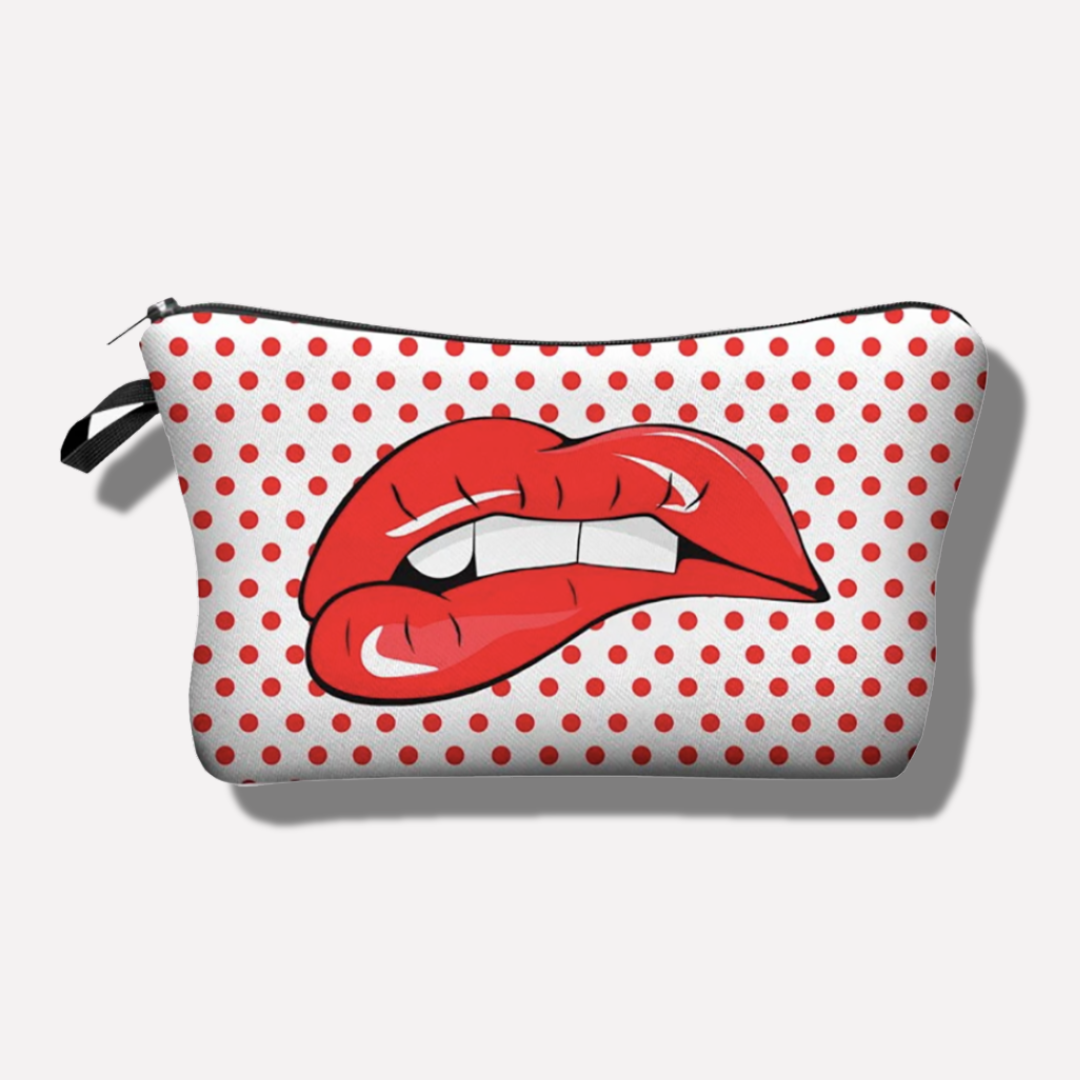 Pouch with red polka dots and a graphic of red lips on a white background