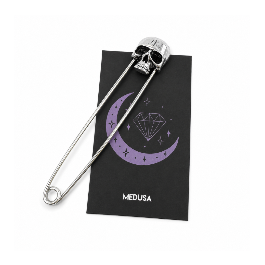 skull safety pin on Medusa card
