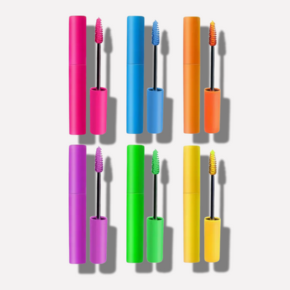 Set of colorful mascara tubes with applicators on a white background