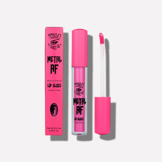 Pink lip gloss with packaging on a white background