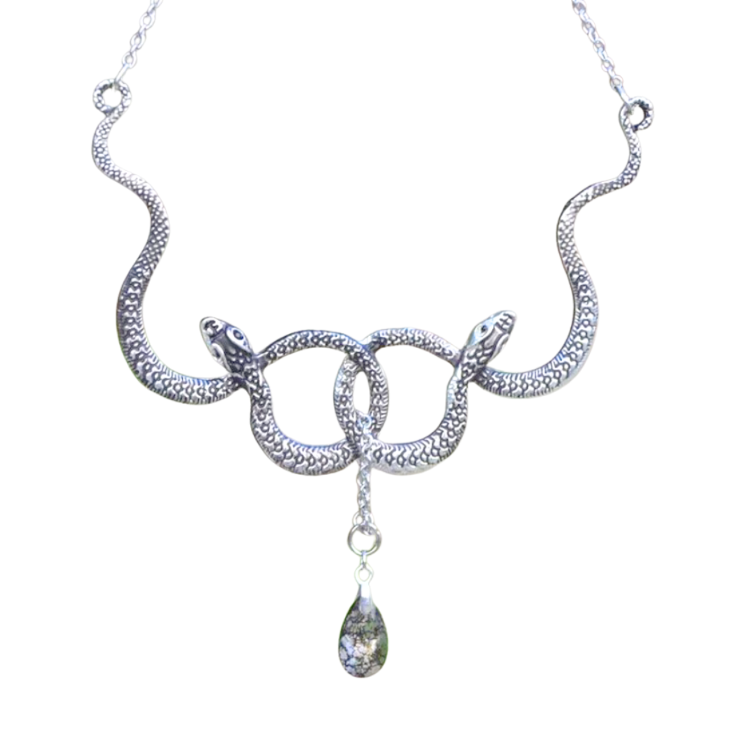 Silver snake-shaped necklace with a teardrop pendant on a white background