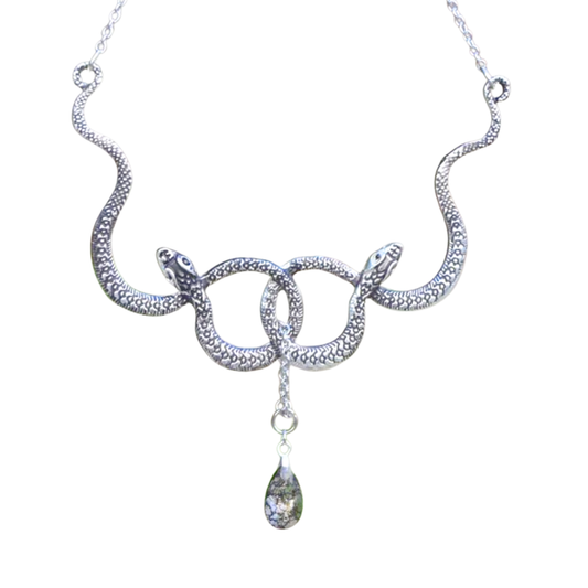 Silver snake-shaped necklace with a teardrop pendant on a white background