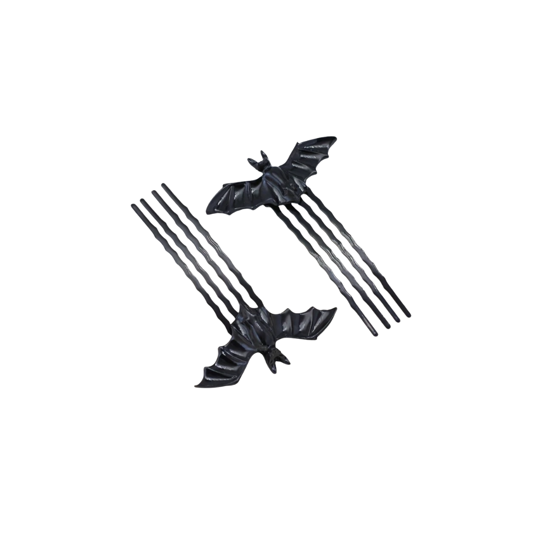 Black bat-shaped hair accessories on a white background