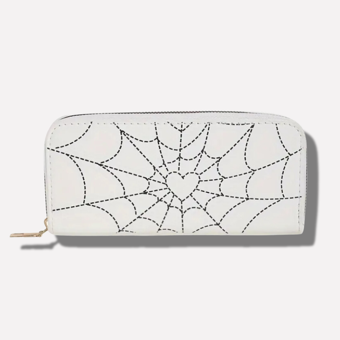 White wallet with spider web pattern on a white background