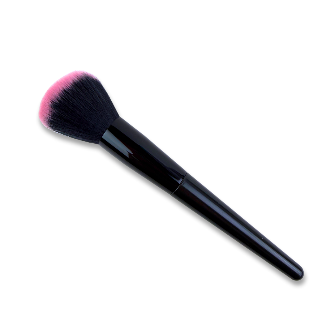 Makeup brush with pink bristle tip on a white background