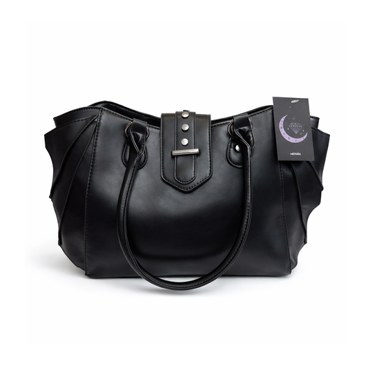 Black handbag with a visible brand tag on a white background