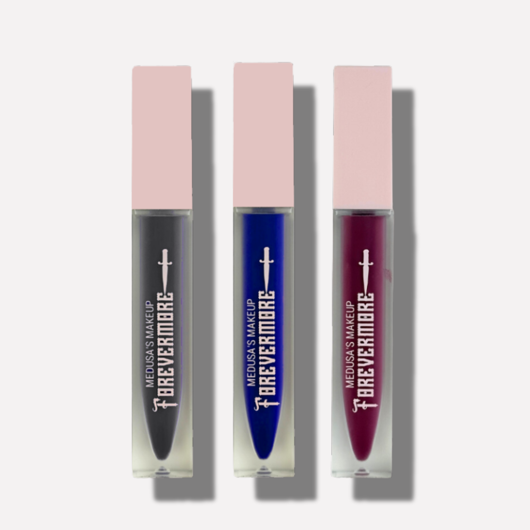 Three lip glosses with pink caps and visible brand name on a white background