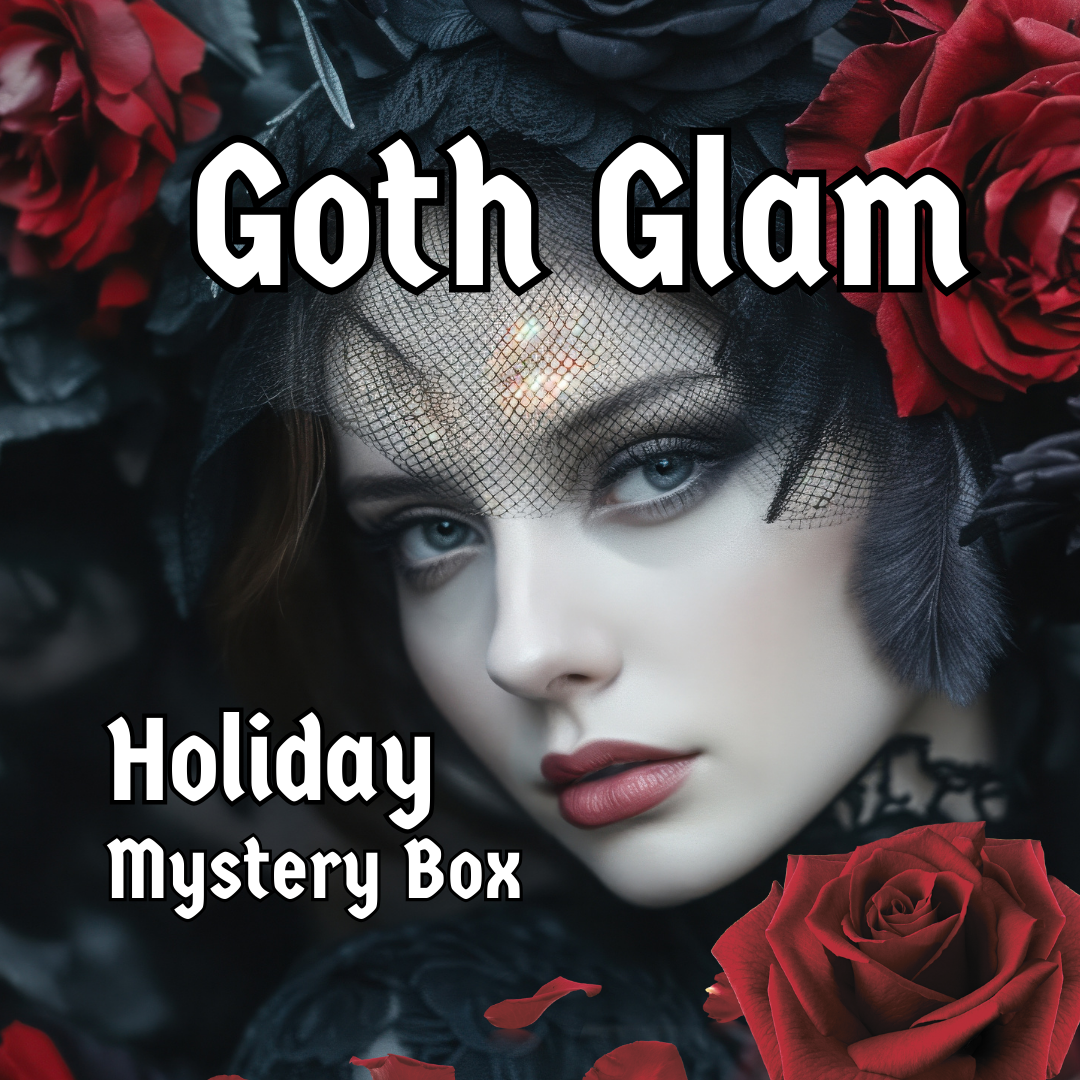 Goth Glam Holiday Mystery Box with a woman's face surrounded by red and black roses.