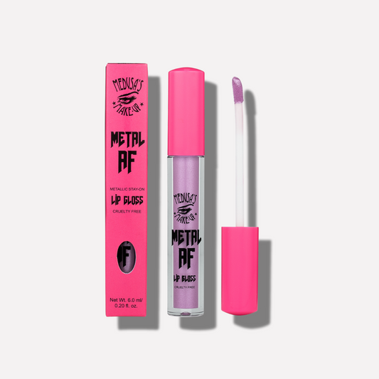 Metallic lip gloss with pink packaging on a white background