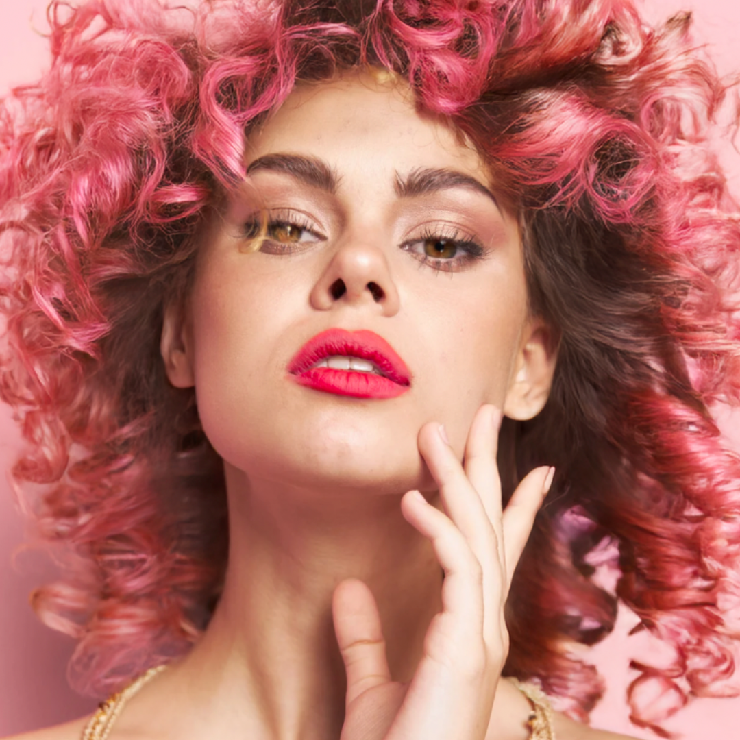 Model wearing pink lipstick