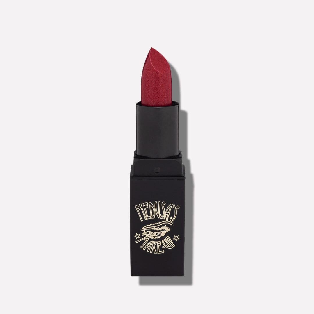 Red lipstick in a black case with a brand logo on a white background