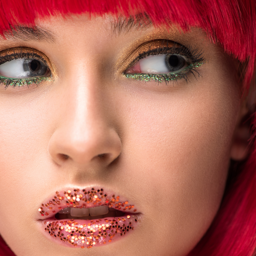 model wearing glitter on her eyes and lips