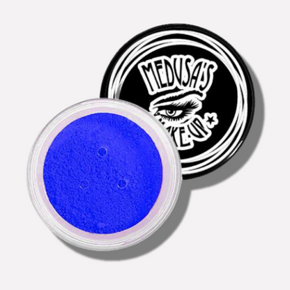 Blue powder in a container with Medusas Head logo on a white background