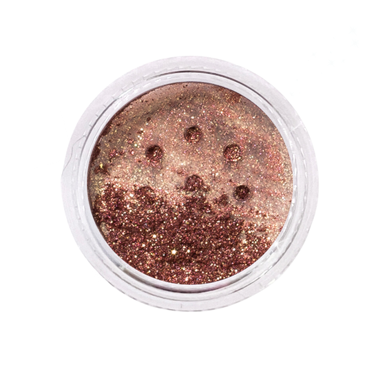 Metallic glitter in a small open container on a white background