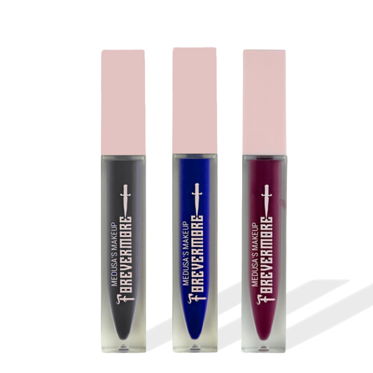 Three lip glosses with pink caps and visible branding on a white background