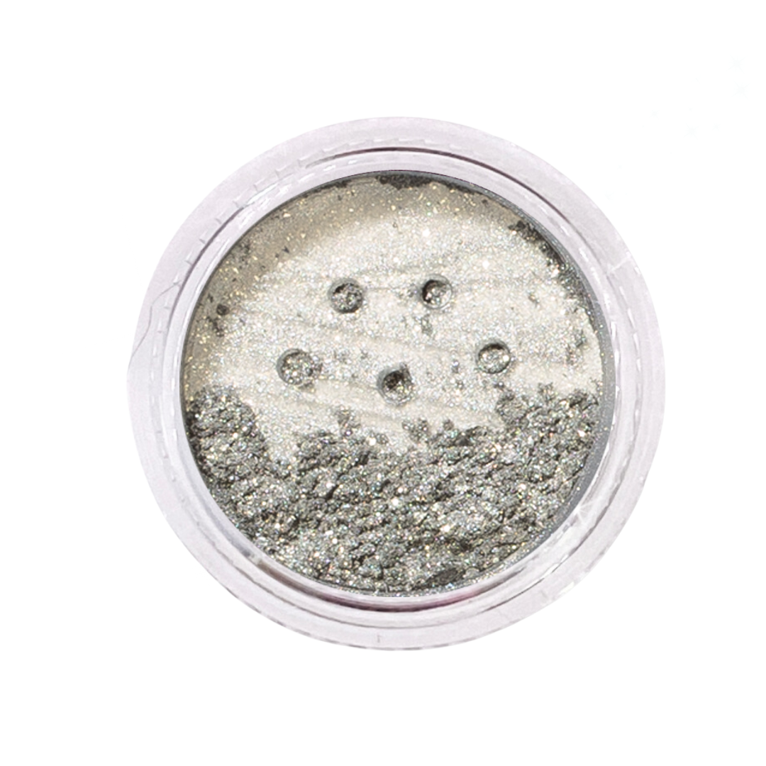Silver glitter in a small round container on a white background