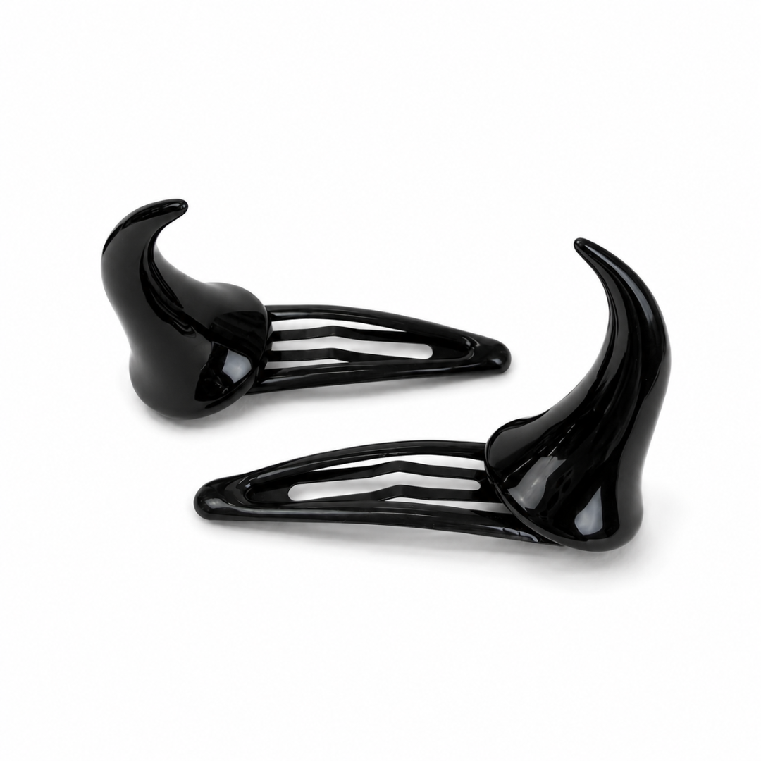 Glossy black horn-shaped hair clips