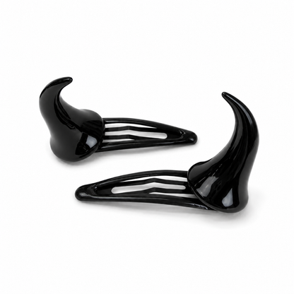 Glossy black horn-shaped hair clips