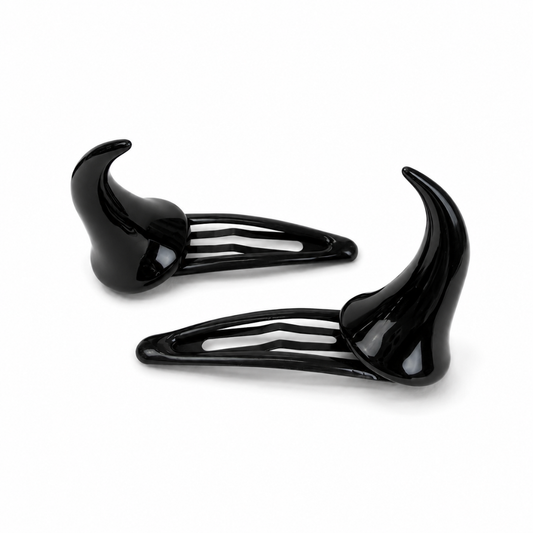 Glossy black horn-shaped hair clips